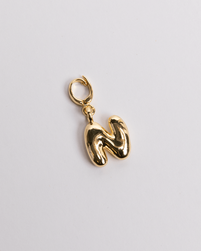 Gold N Letter charm in a bubble style.