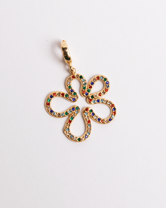 A gold-plated stainless steel charm with a multicolored rainbow flower design.