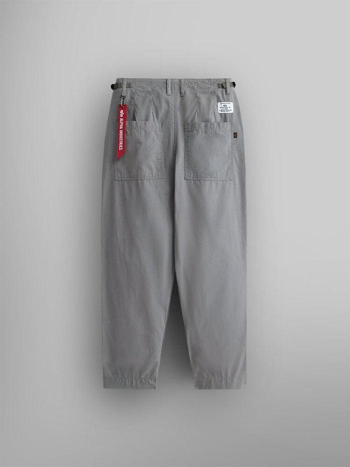 Alpha Industries Womens Barrel Leg Pants in aircraft gray with two large back pockets, red tag on belt loop, and white label above right pocket.