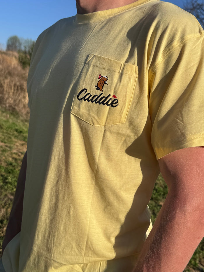 CADDIE LINED UP TEE