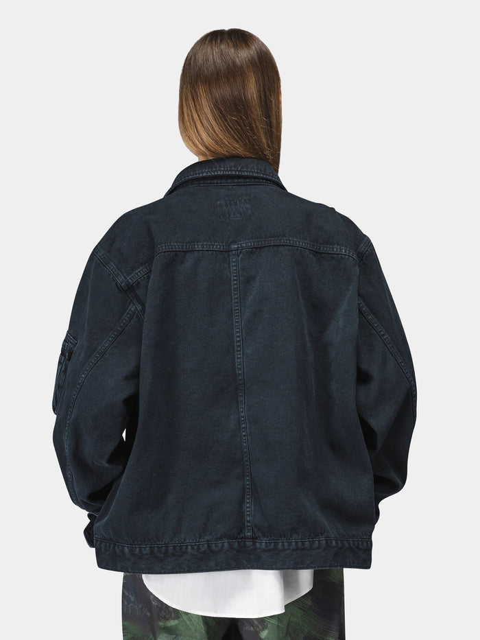 Alpha Industries Ctn Work Overshirt in black cotton with camouflage pants.