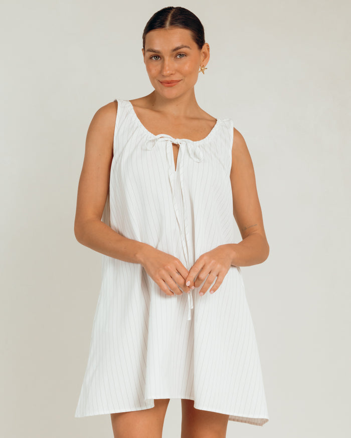 Evie Mini Dress in White Pinstripe - Breastfeeding Friendly Ties - The Lullaby Club
