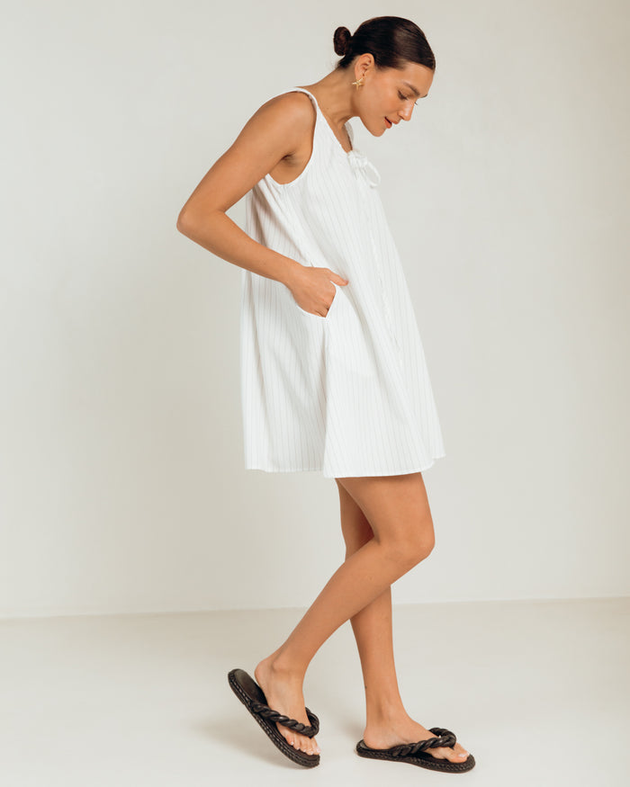 Evie Mini Dress in White Pinstripe - Functional Side Pockets - The Lullaby Club