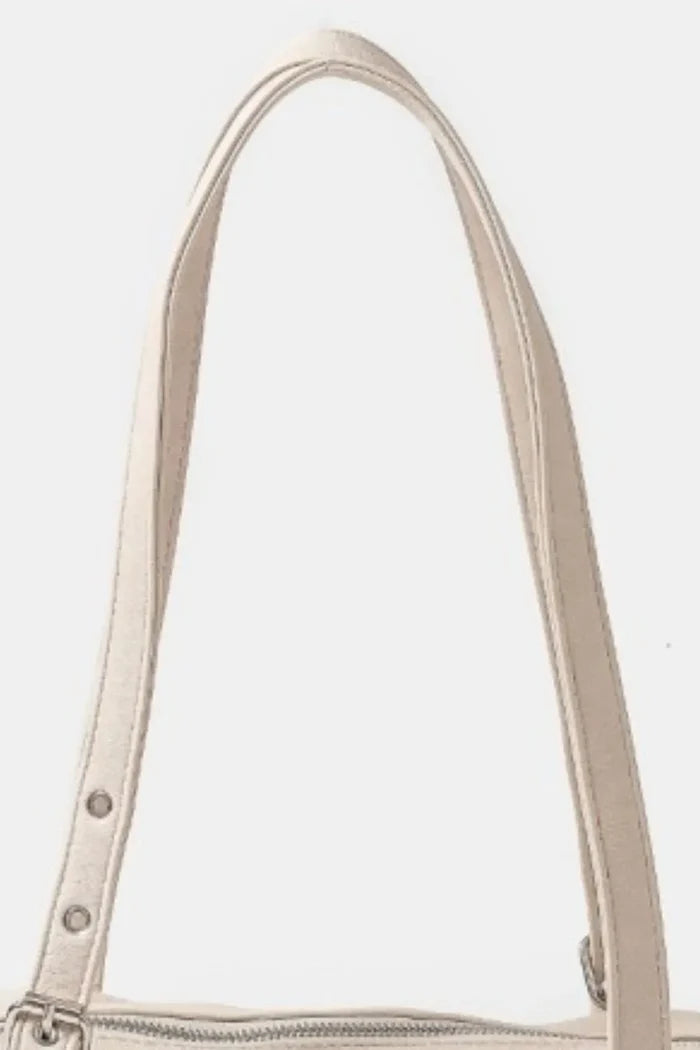 Fame Multi Grommet Belt Strap Rustic Rectangular Hand Bag
