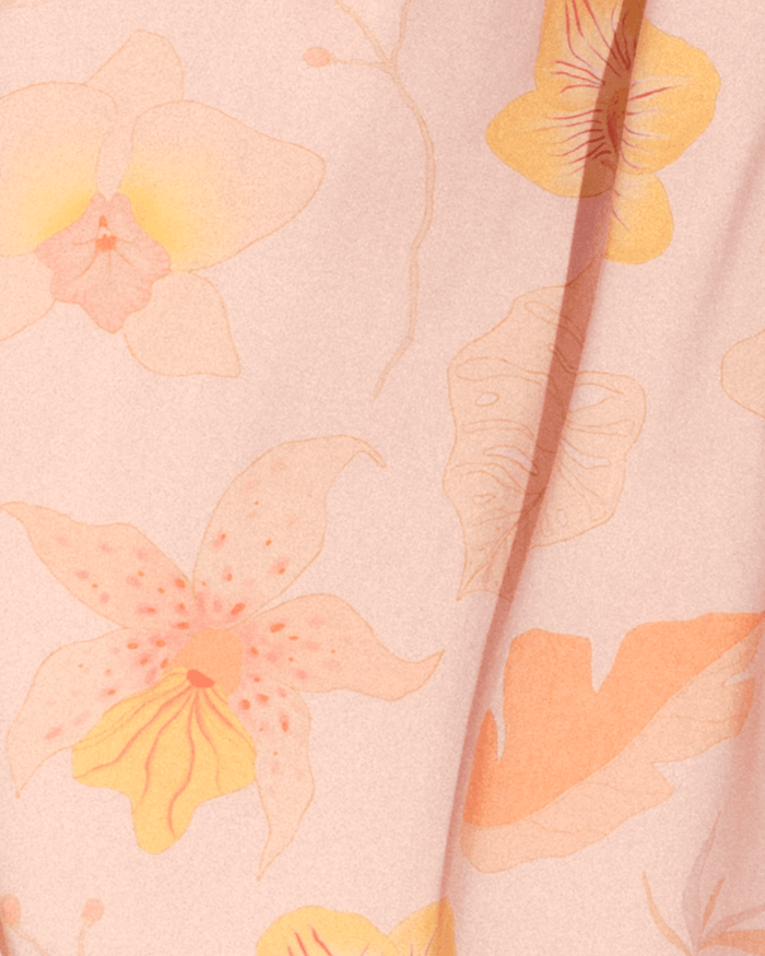 Up-close detail of light pink floral print.