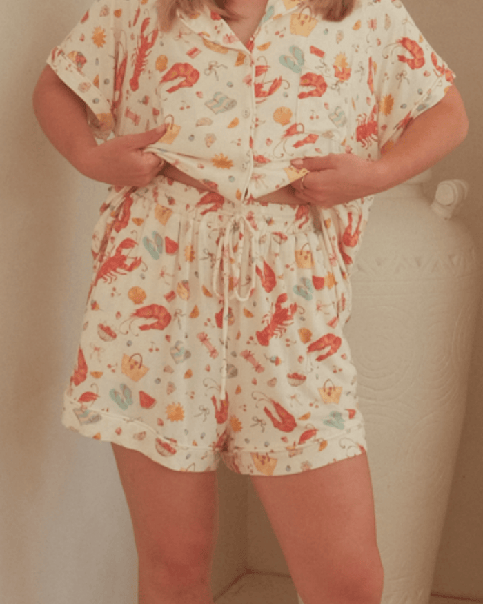 Person wearing a Australia Christmas printed matching PJs.