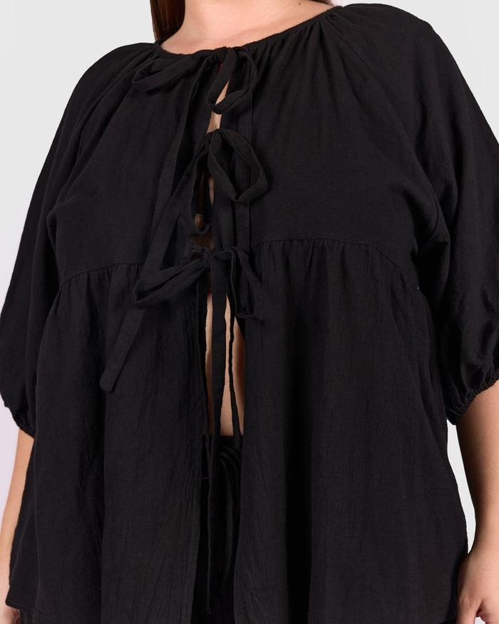 Close up of front ties of black florence top available in sizes AU 6-26