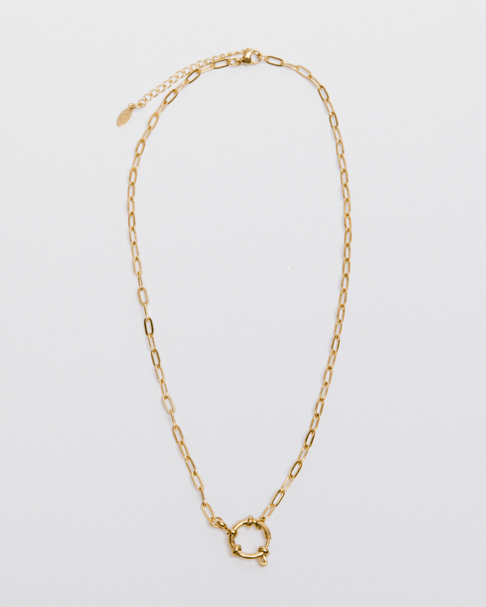 A gold link charm necklace with an adjustable clasp, displayed against a white background.