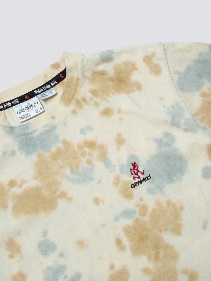 Gramicci X Alpha Cotton Camo Tie Dye Tee by Alpha Industries, beige and light blue tie dye cotton with small red and black embroidered Gramicci logo on chest.