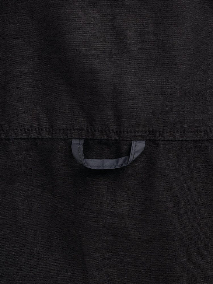 Alpha Industries Long Sleeve Multi Pocket Shirt, black, with small horizontal loop stitched near center of fabric.