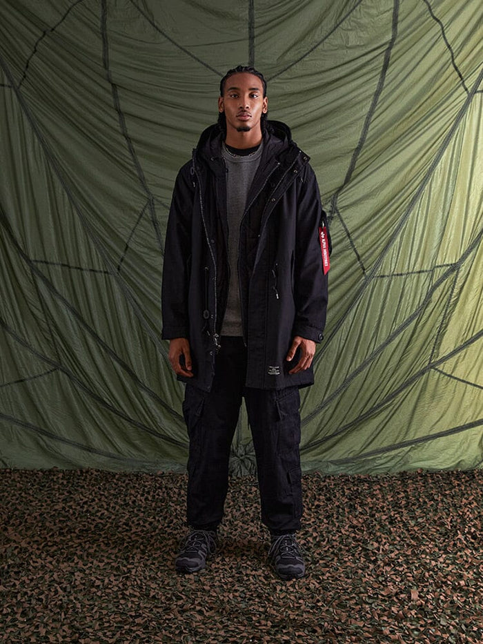 Alpha Industries M-59 Fishtail Mod Parka, black color, parachute-like fabric, front zip and snap closures.