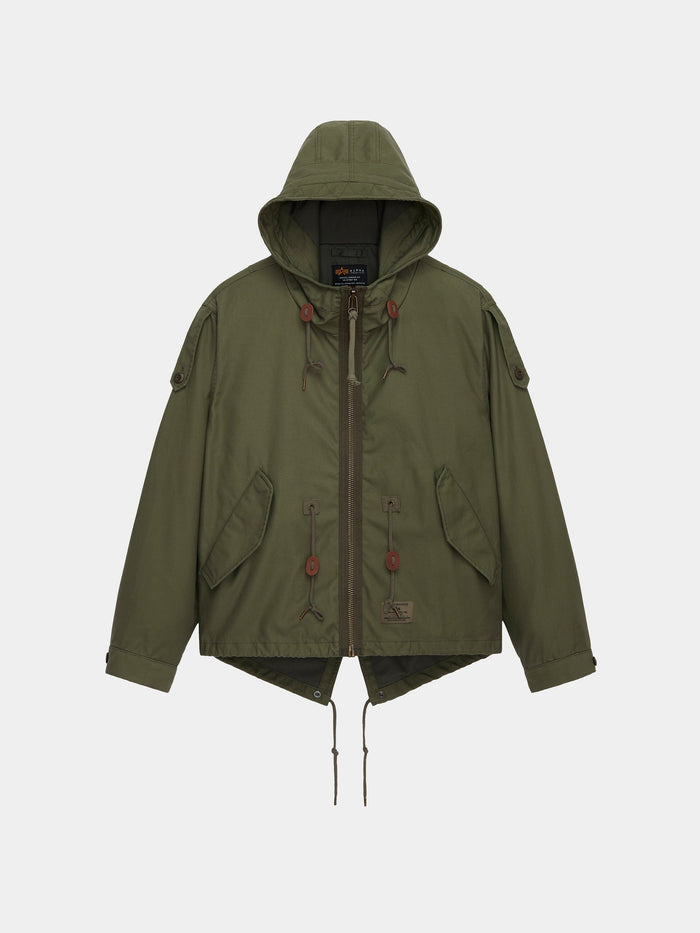 Alpha Industries M-65 Mod Fishtail Field Coat in Og-107 Green with hood, front zipper, drawstrings, front flap pockets, button details.