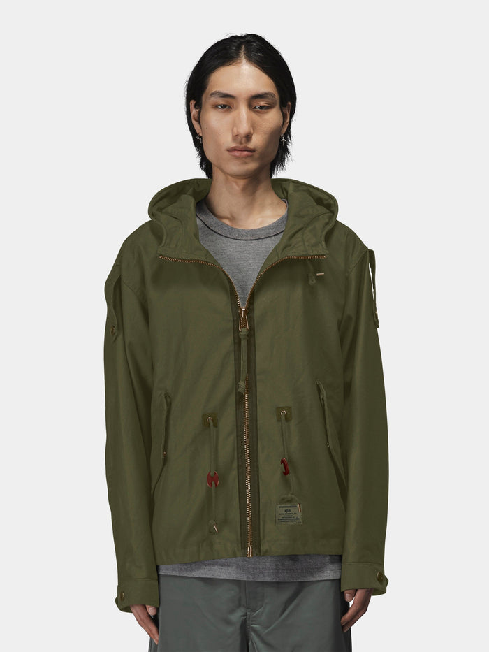 Alpha Industries M-65 Mod Fishtail Field Coat in olive green with fishtail hem and front closures.