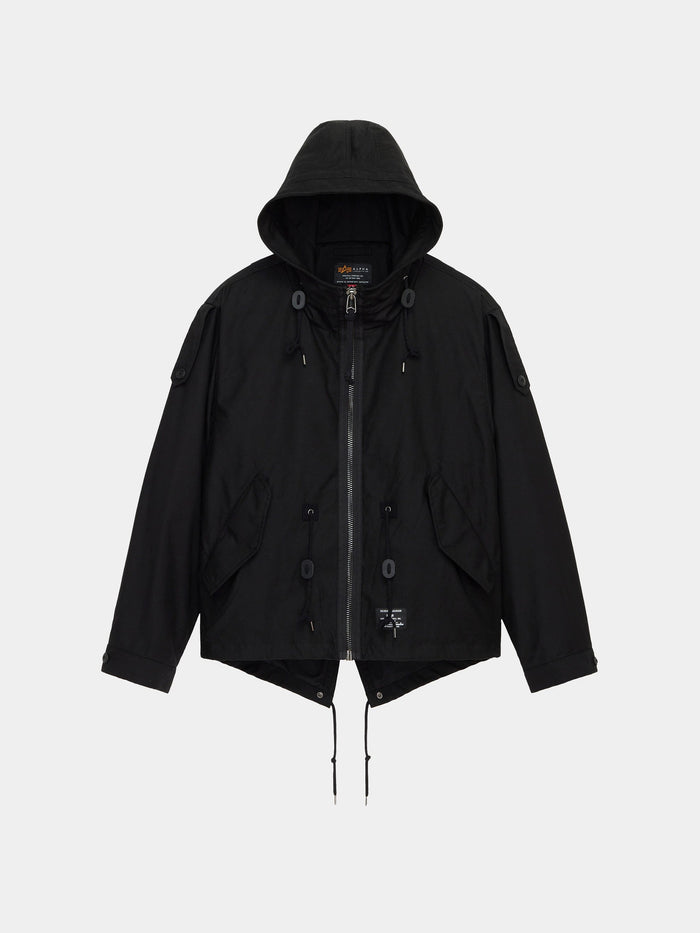 Alpha Industries M-65 Mod Fishtail Field Coat in Black with front zipper, drawstrings at hem and hood, flap pockets, sleeve buttons.