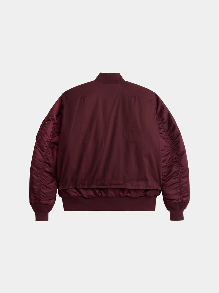 Alpha Industries MA-1 Mixed Cotton Flight Jacket in maroon, ribbed collar, cuffs, hem, quilted sleeves, smooth back.