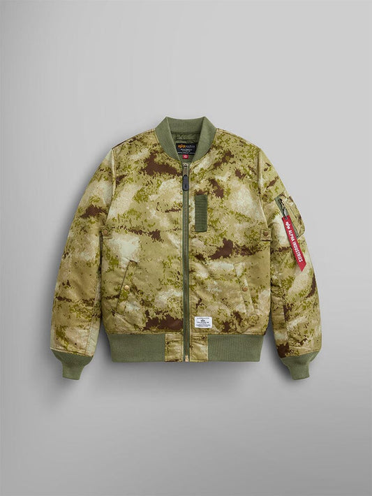 MA-1 Mod Bomber Jacket by Alpha Industries, Green Blur Camo print, front zipper, olive green cuffs and hem, red Remove Before Flight sleeve tag, water-resistant finish.