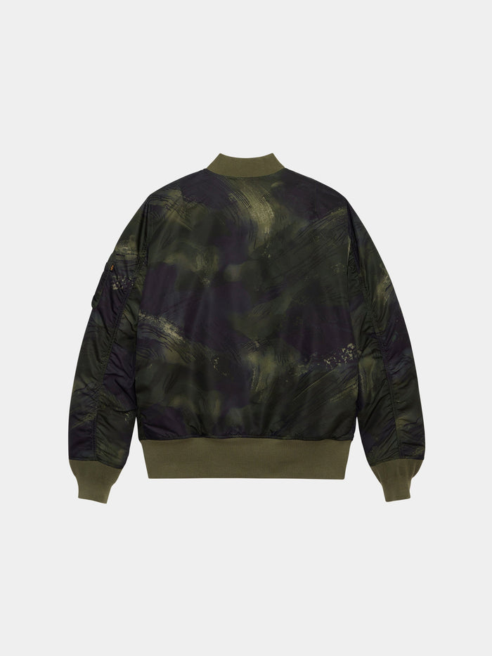 Alpha Industries MA-1 Mod Bomber Jacket with water-resistant olive and black camo, olive ribbed cuffs, hem, and collar.
