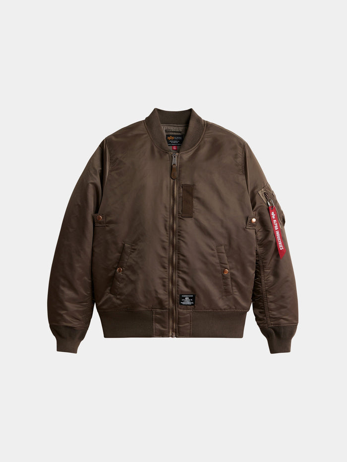 Alpha Industries MA-1 Mod Bomber Jacket in coyote brown with front zipper, utility pocket, red tag, two front pockets, ribbed cuffs and hem.