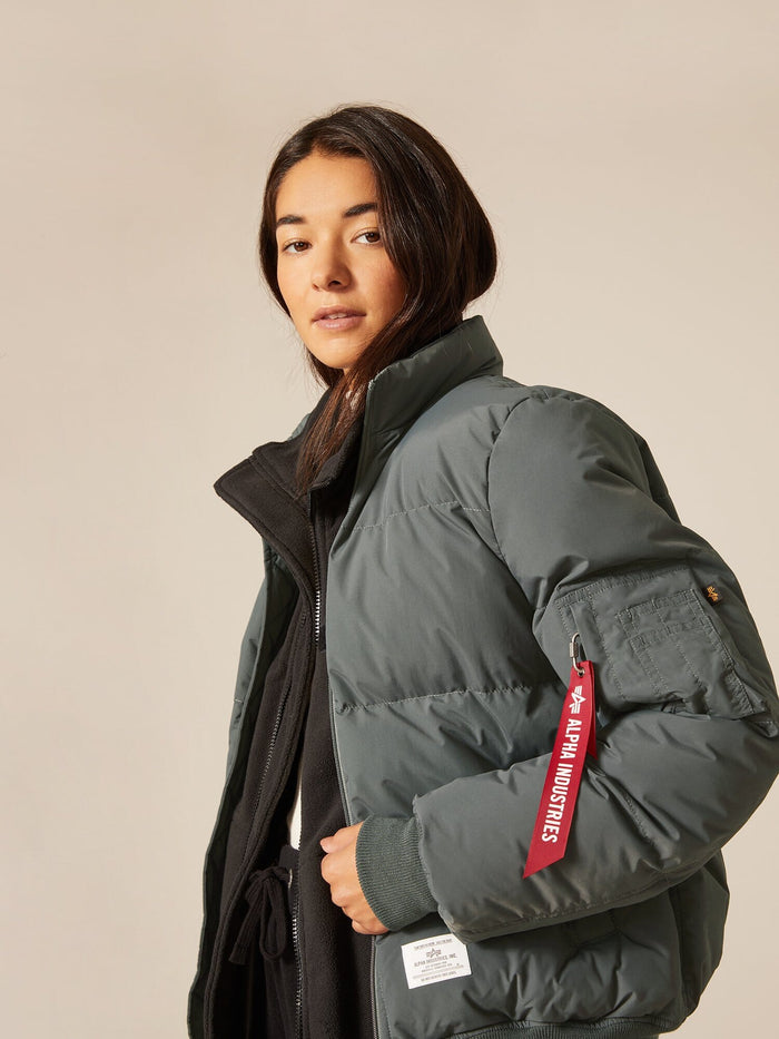 Alpha Industries MA-1 Quilted Bomber Jacket, green, water-resistant finish, red Alpha Industries tag on sleeve.