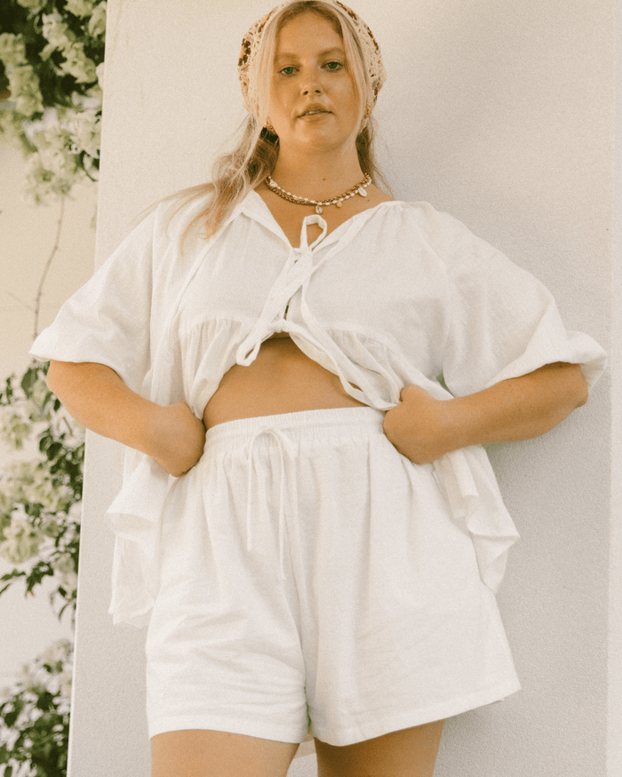 Matilda Shorts in White – Oversized maternity and postpartum lounge shorts with an elastic waistband.