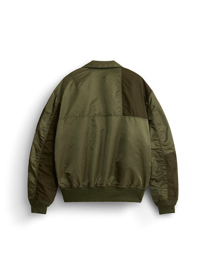 Alpha Industries Mixed Media CWU 36P Mod Jacket in olive green with ribbed hem and cuffs, sleeve and body panel details.