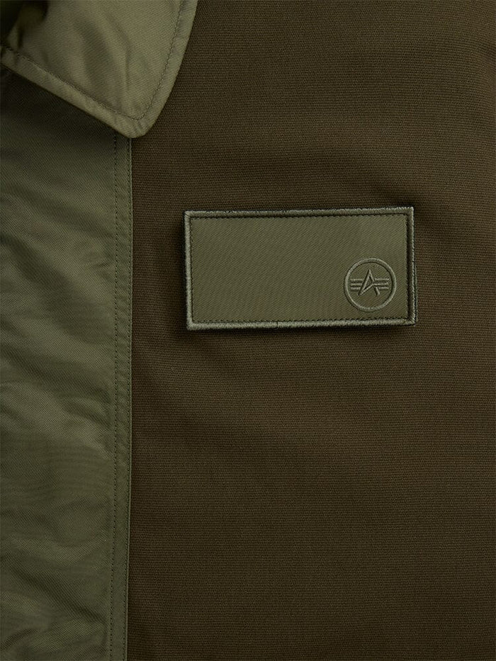 Alpha Industries Cwu 36p Mod Jacket, Olive-Green Fabric, Rectangular Patch With Embossed Star Emblem.