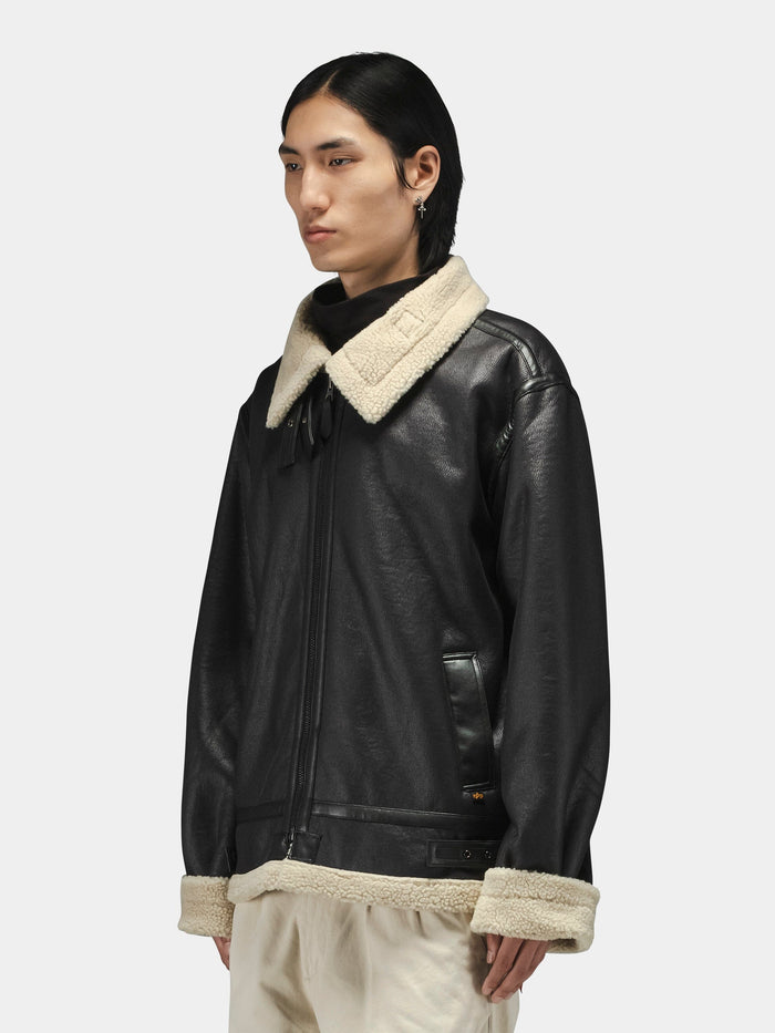 Alpha Industries Mouton B-3 faux leather aviator jacket with beige shearling collar and cuffs.
