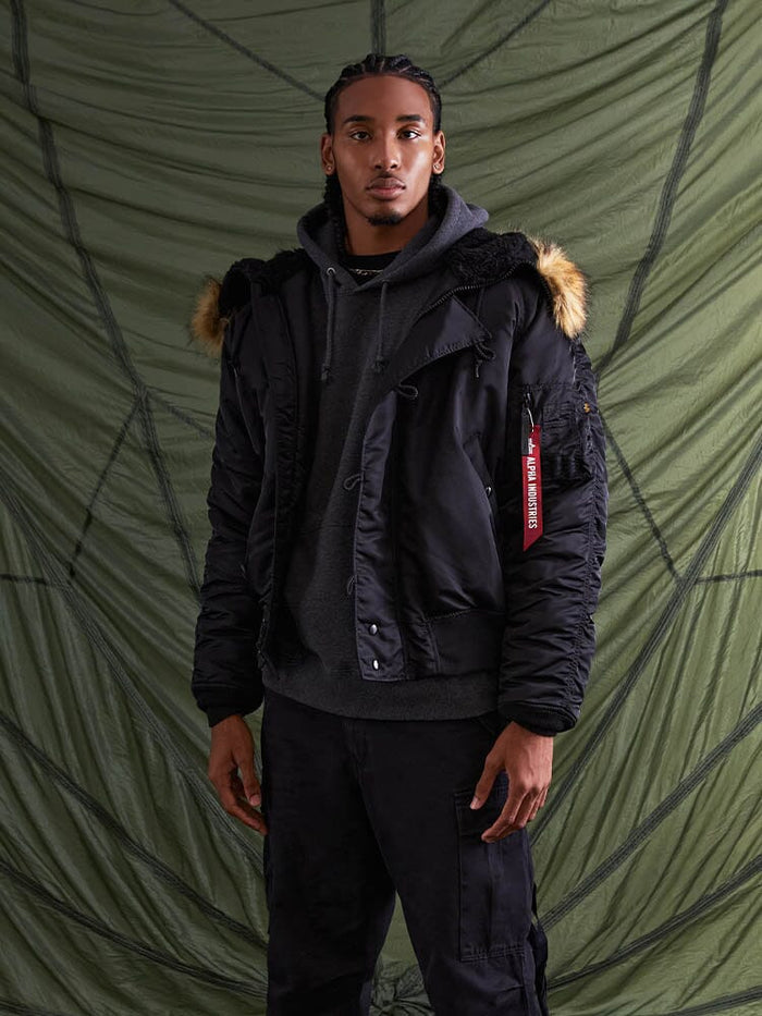 Alpha Industries N-2B Short Waist Parka, black, water-repellent, faux mouton fur-trimmed hood.