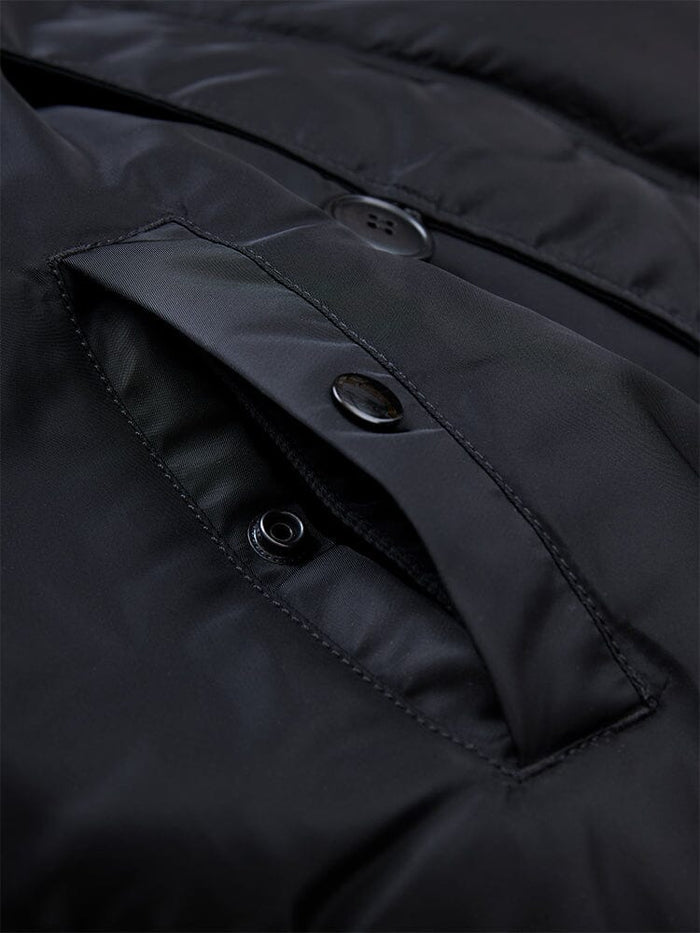 Alpha Industries N-2B Short Waist Parka in black, flap pocket with snap button closure, visible stitching details, water repellent fabric.