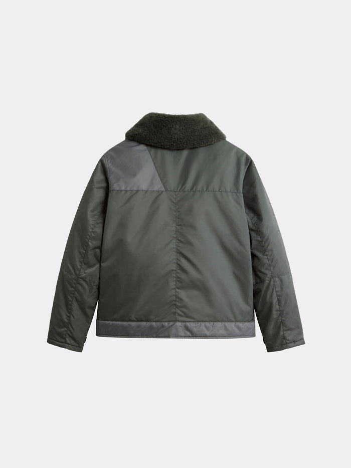 Alpha Industries Nylon Aviator Jacket in dark green nylon with shearling collar and panel details.