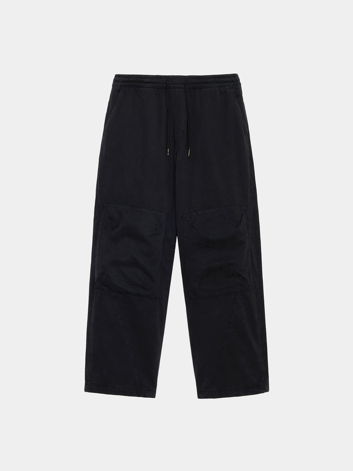 Alpha Industries Oversized Washed Pant in black, elastic waistband, drawstring, large knee patch pockets, 100% cotton.
