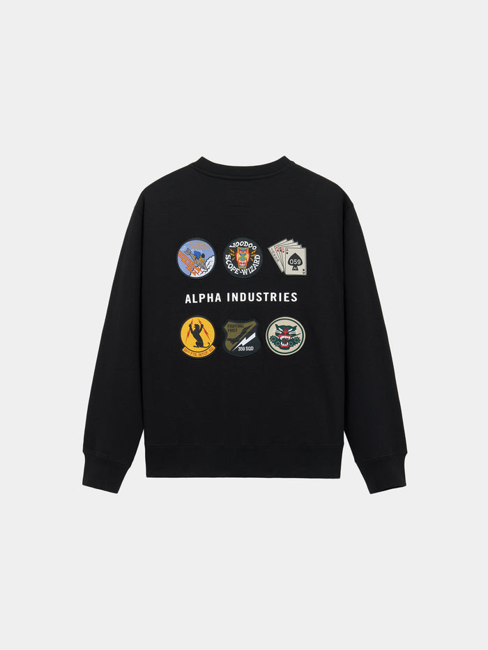 Patched Crewneck by Alpha Industries in Black, cotton-poly sweatshirt with graphic patches and Alpha Industries branding on back.