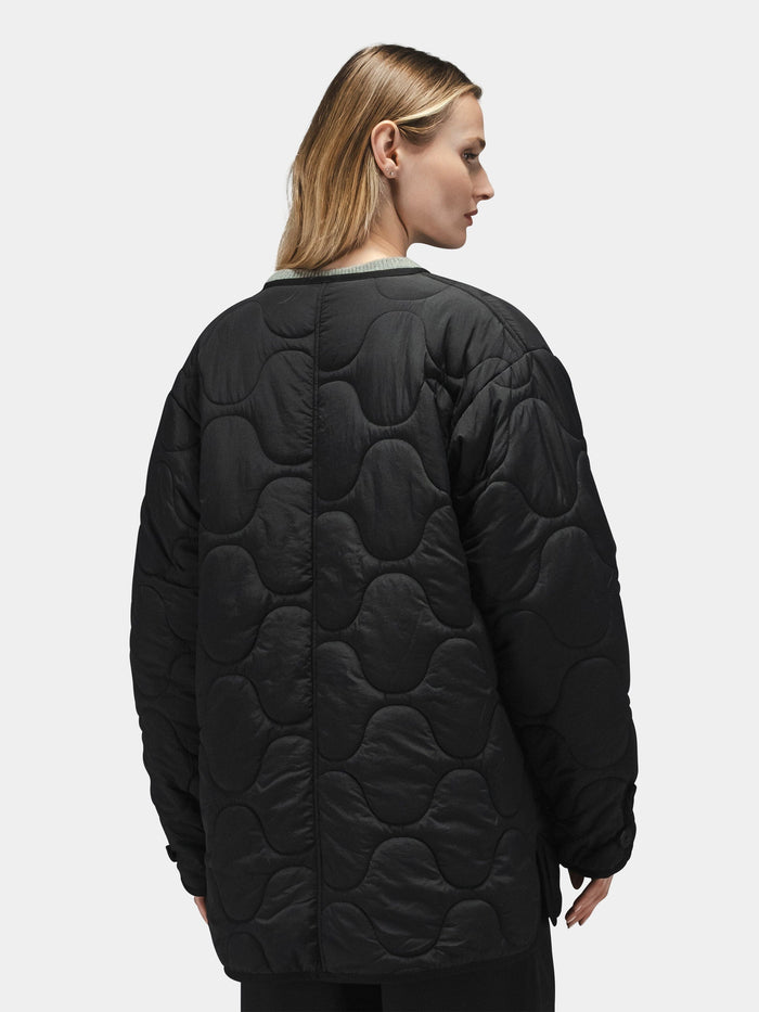 Alpha Industries Reversible Als/92 Mod Liner Womens, black quilted nylon ripstop jacket with wavy pattern.