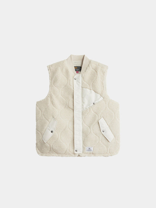 Alpha Industries Sherpa Onion Quilting Vest in Dune White with cream sleeveless onion-quilted shell, snap buttons, and three pockets.