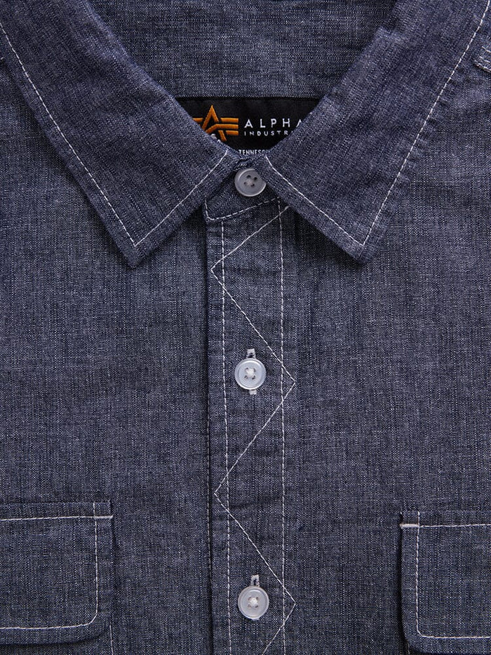 Alpha Industries Short Sleeve Multi Pocket Shirt, dark blue, white stitching, chest flap pockets, visible brand label inside collar.