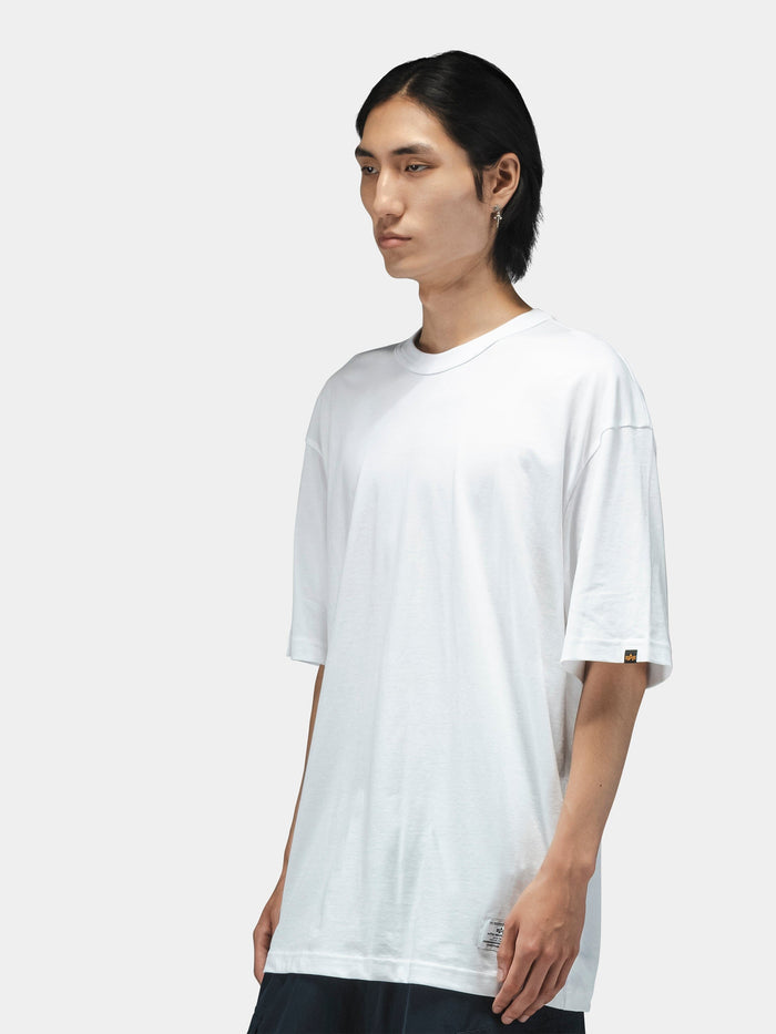 Alpha Industries Short Sleeve Relaxed Tee in dark color, features short sleeves and relaxed fit.