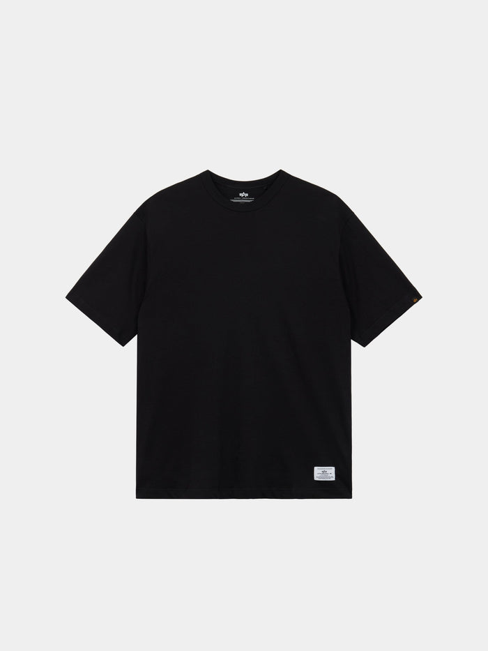 Alpha Industries Short Sleeve Relaxed Tee in black with crew neck, short sleeves, and small white label at the hem.