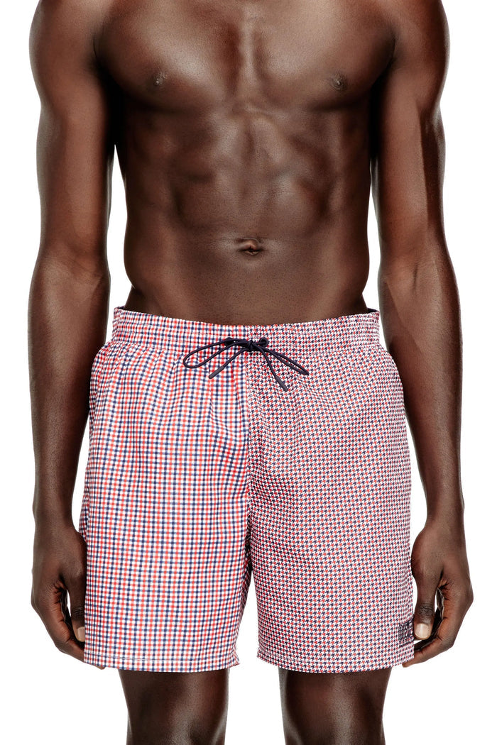 Swim shorts with mixed patterns