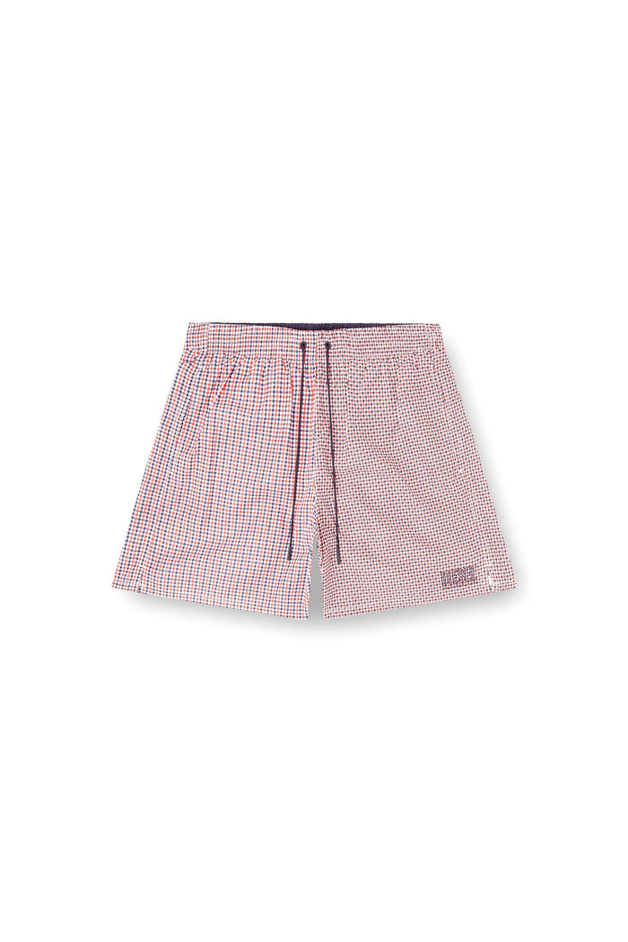 Swim shorts with mixed patterns