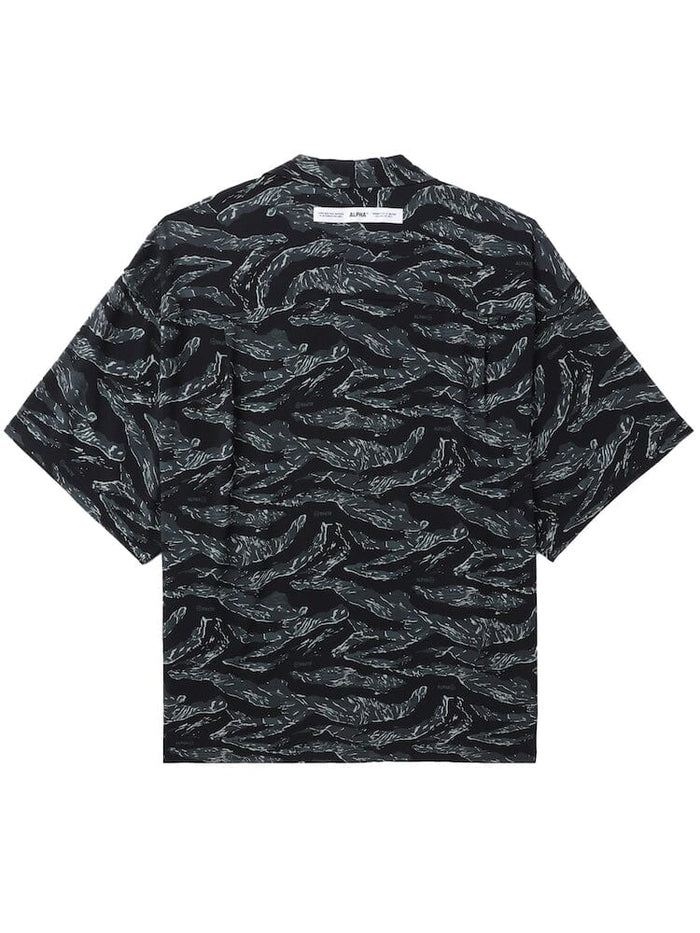 Unfrm Army Hawaii Shirt by Alpha Industries, black, loose-fit short-sleeve button-down with all-over abstract white wave pattern.