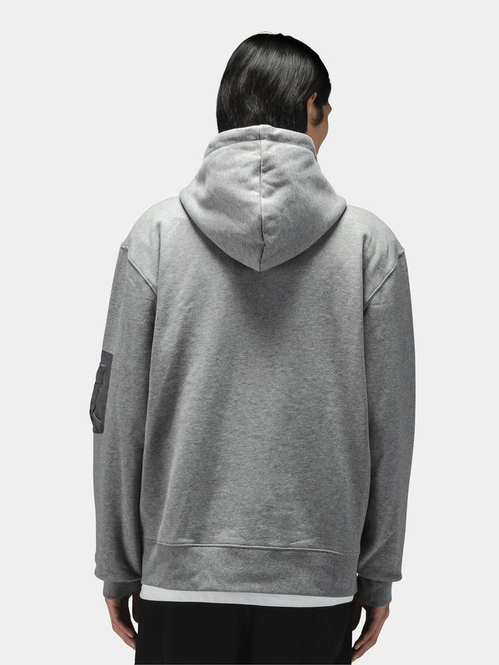 Alpha Industries Utility Pocket Full Zip Up hoodie in gray with a black patch on the left sleeve.