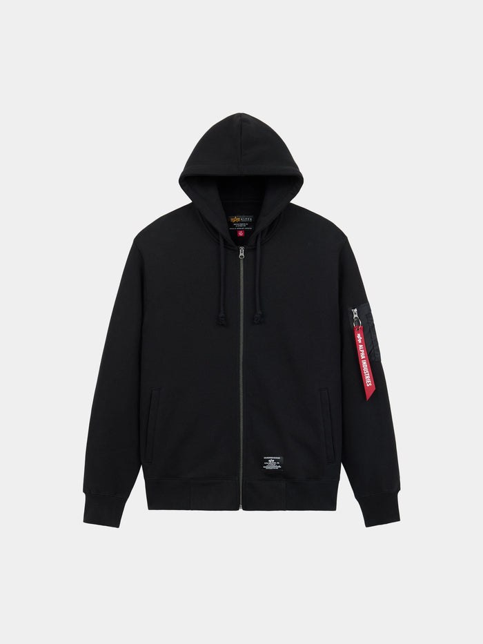 Alpha Industries Utility Pocket Full Zip Up in black with front pockets, drawstring hood, ribbed cuffs, red tag on left sleeve zipper.