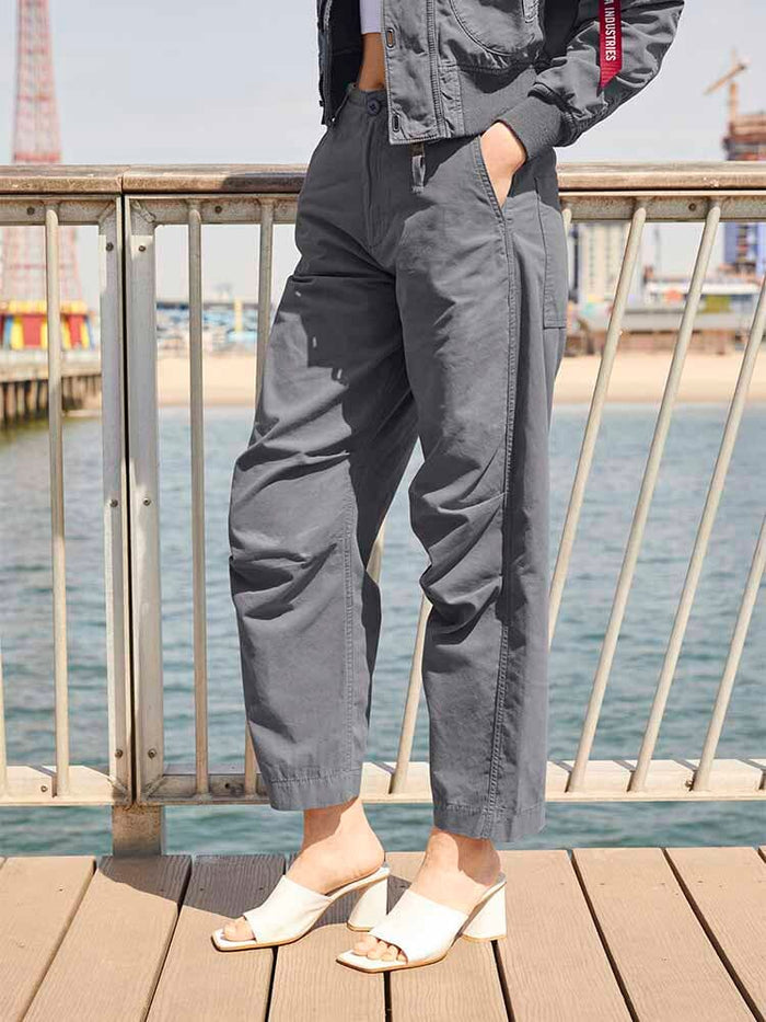 Alpha Industries Womens Barrel Leg Pants in Aircraft Gray, Matching Jacket, White Heeled Sandals.