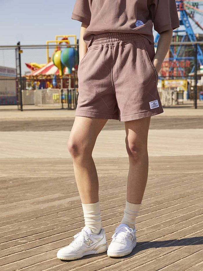 Alpha Industries Womens Quilted Shorts, elastic waistband, mauve, quilted design.